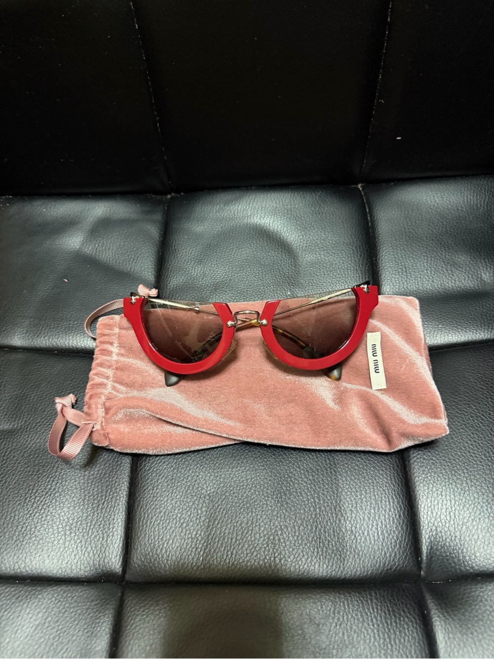 Miu Miu Women’s Red Cat-Eye Sunglasses